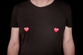 Two hearts on mans t-shirt. Funny love concept