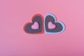 Two hearts on a pink background in the center and two small hearts. The Concept Of Valentine`s Day Royalty Free Stock Photo