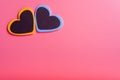 Two hearts on a pink background in the upper left corner. The concept of Valentine`s day Royalty Free Stock Photo