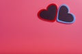 Two hearts on a pink background in the upper right corner. The concept of Valentine`s day Royalty Free Stock Photo
