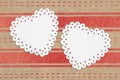 Two hearts with red and beige sparkle ribbon weave textured mockup