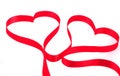 Two hearts from red ribbon