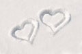 Two hearts in snow Royalty Free Stock Photo