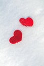 Two hearts on the snow, sunny day. Valentines day or wedding amazing greeting card