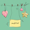 Two hearts and star hanging on a string