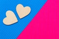 Two Hearts on the two-tone corrugated cardboard background. Blue and pink trendy colors. Abstract geometric background. Valentine Royalty Free Stock Photo