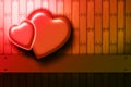 Two hearts on the wood background