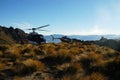 Two helicopters landing in the Southern Alps with ledge picnic New Zealand