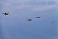 Helicopters towing gliders at an air show
