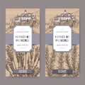 Two Herbes de Provence labels with town, lavender and rosemary.