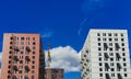 Two high-rise buildings under construction against a bright blue sky Royalty Free Stock Photo