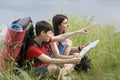 Two hikers with the map Royalty Free Stock Photo