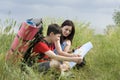 Two hikers with the map Royalty Free Stock Photo