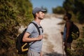 Two hikers men walk on trek in mountain. Trekking in mountains. Hills and mounts in sport tourism Royalty Free Stock Photo