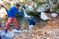 Two Hikers young Man and Smiling Woman holding hands Royalty Free Stock Photo