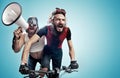 Two hilarious cyclists involved in a contest Royalty Free Stock Photo