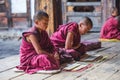 Two Himalayan Bhutanese young novice monks chanting , Bhutan Royalty Free Stock Photo