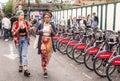 Two hipster girls dressed in cool londoner style walking in Brick lane Royalty Free Stock Photo