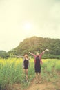 Two hipster woman traveling and raising hands enjoying with flow Royalty Free Stock Photo