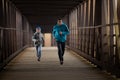 Two Hispanic Brothers Run A Race Down Bridge