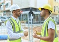 Two hispanic men architects smiling confident speaking at street Royalty Free Stock Photo