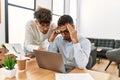 Two hispanic men business workers arguing at office Royalty Free Stock Photo