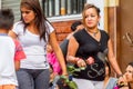 Two Hispanic Teenagers Waiting To Begin Annual Carnival