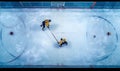 Two Hockey Players Engaged in a Game on the Ice Royalty Free Stock Photo