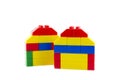 Two home icon made from plastic building blocks isolated