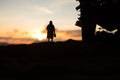 Two homeless little girl walking in destroyed city, soldiers and helicopters and tanks are still attacking the city Royalty Free Stock Photo