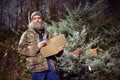 Homeless older man spending christmas time alone in park Royalty Free Stock Photo