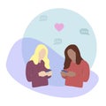 Two homosexual women of different race looking at their phones, sending messages. Concept of finding a date through social media