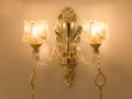 Two-horn wall sconce