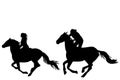 Two horse riders galloping Royalty Free Stock Photo