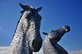 Two horses heads made of steel.