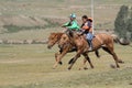 Two horses racing during Naadam festival Royalty Free Stock Photo