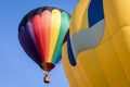 Two Hot Air Balloons Against a Blue Sky Royalty Free Stock Photo