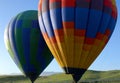 Two hot air balloons are ready to take off.