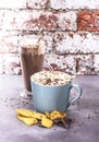 Two hot chocolate drinks with gingerbread and dark chocolate