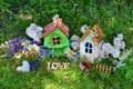 Two houses with decorations, love letters, flowers and berries Royalty Free Stock Photo