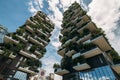 Two houses with plants on the balconies in the city Royalty Free Stock Photo