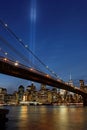 Two huge blue lights over Brooklyn bridge