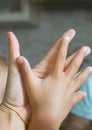 Two human hands of adult and child hold together Royalty Free Stock Photo