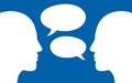 Two human heads silhouette talking through speech bubbles. Dialogue,contact, conversational exchange between two individuals