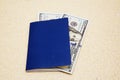 Two hundred dollars in the blue passport Royalty Free Stock Photo