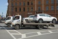 Two Hyundai HD78 car tow trucks with immersed cars