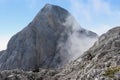 Two ibex resting in front of a mountain Royalty Free Stock Photo