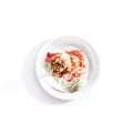 Two Ice Cream Balls or Iced Cream with Strawberry Sauce and Nuts Royalty Free Stock Photo