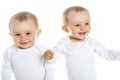 Two identical twins on a white isolated background Royalty Free Stock Photo