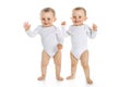 Two identical twins on a white isolated background